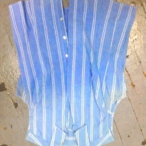 Rider blouse flattering with horizontal stripes.